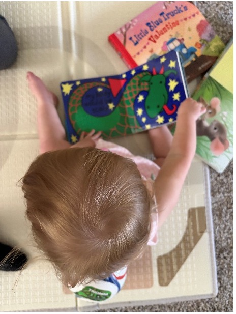 Mila reading a book